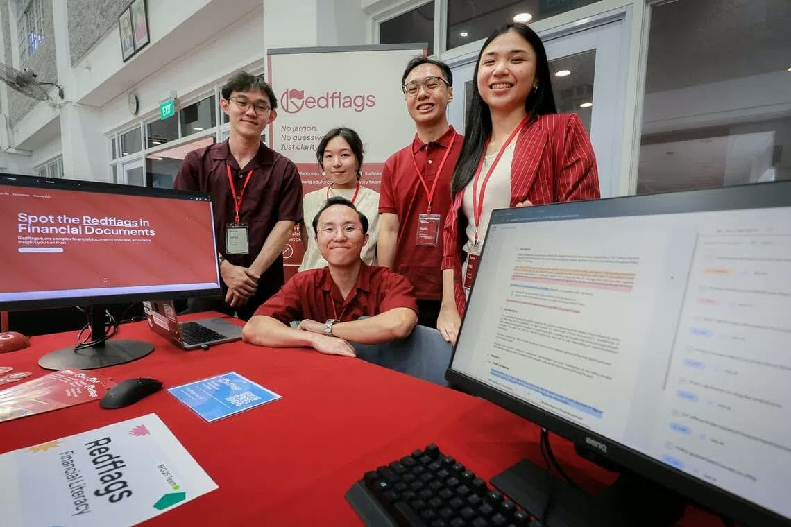 The Redflags team at their booth, pictured by The Straits Times