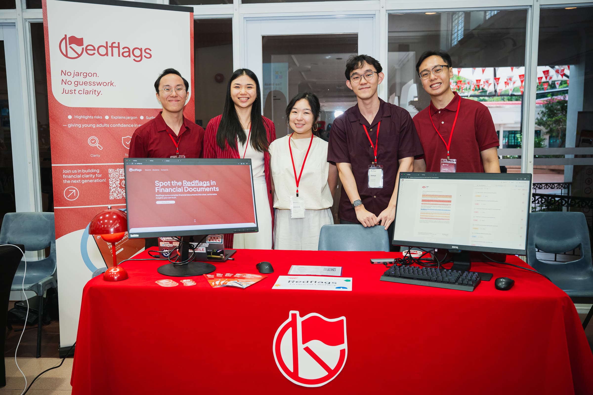 The Redflags booth, with the product on screen